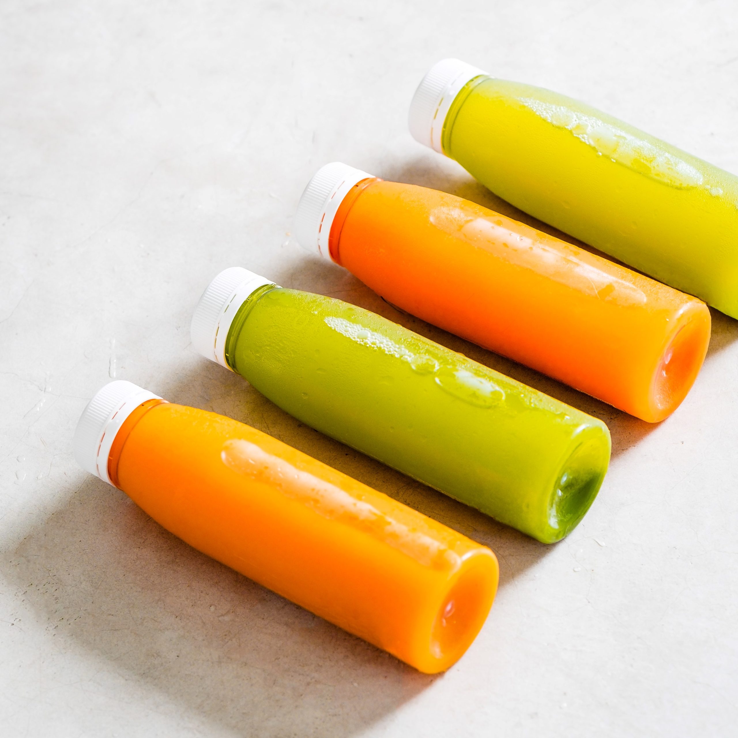 Compostable juice bottles. HPP juice. A Plant-based product in a plant  bottle.